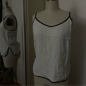 Forever 21 White flowy tank top with black trim, small flaw on back, Size M